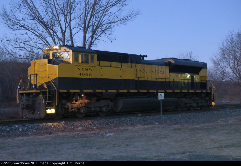NYSW 4066 sits alone awaiting an assignment at dawn.
